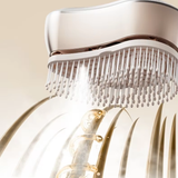 Massage comb for scalp stimulation and hair care.